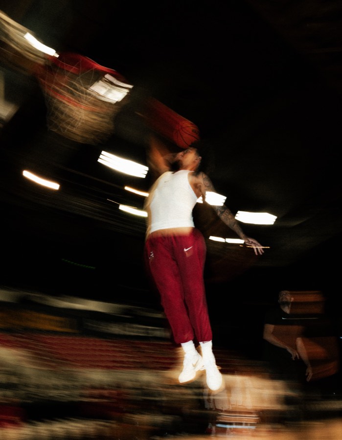 A player rising over the Boutwell floor.